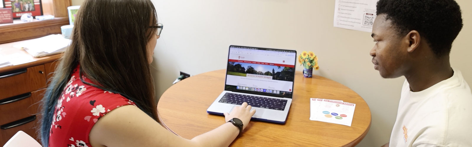 Student working with advisor