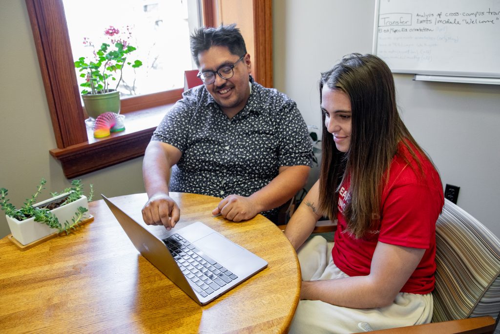 Advisor working with a student